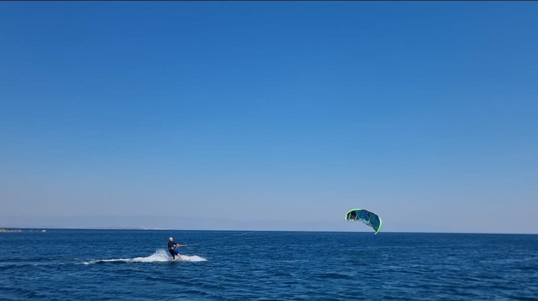 A kitesurfer on open water
